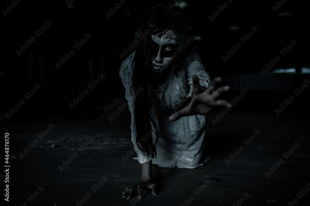 Portrait of asian woman make up ghost face,Horror scene,Scary background,Halloween poster Portrait of asian woman make up ghost face,Horror scene,Scary background,Halloween poster