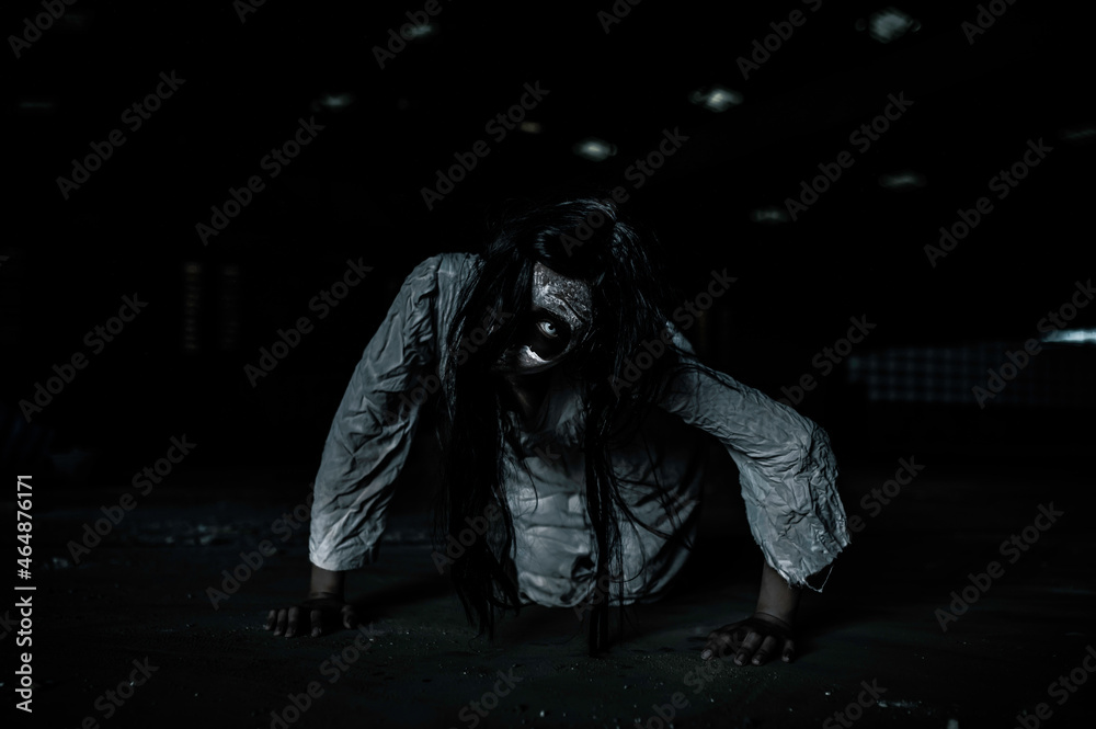 Portrait of asian woman make up ghost face,Horror scene,Scary background,Halloween poster Portrait of asian woman make up ghost face,Horror scene,Scary background,Halloween poster