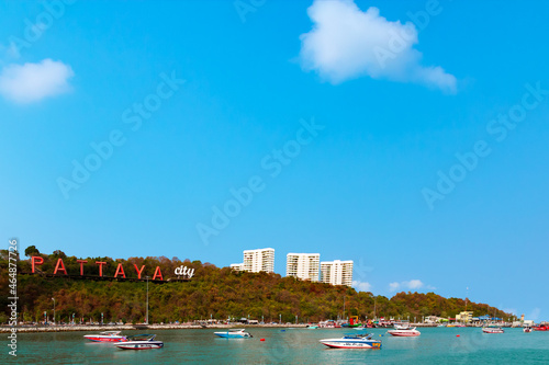 Tropical landscape at Pattaya City is near Koh Lan island in the Thai sea with boats and beautiful tropical beaches.