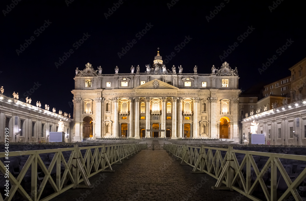 Saint Peter Basilica in Vatican City illuminated by night, masterpiece of Michelangelo and Bernini