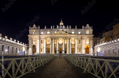 Saint Peter Basilica in Vatican City illuminated by night, masterpiece of Michelangelo and Bernini
