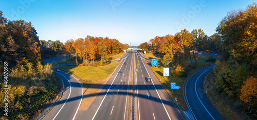 View of the German highway in autumn. Multi Lane Autobahn