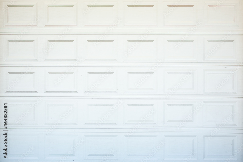 A view of a white painted garage door, as a background.