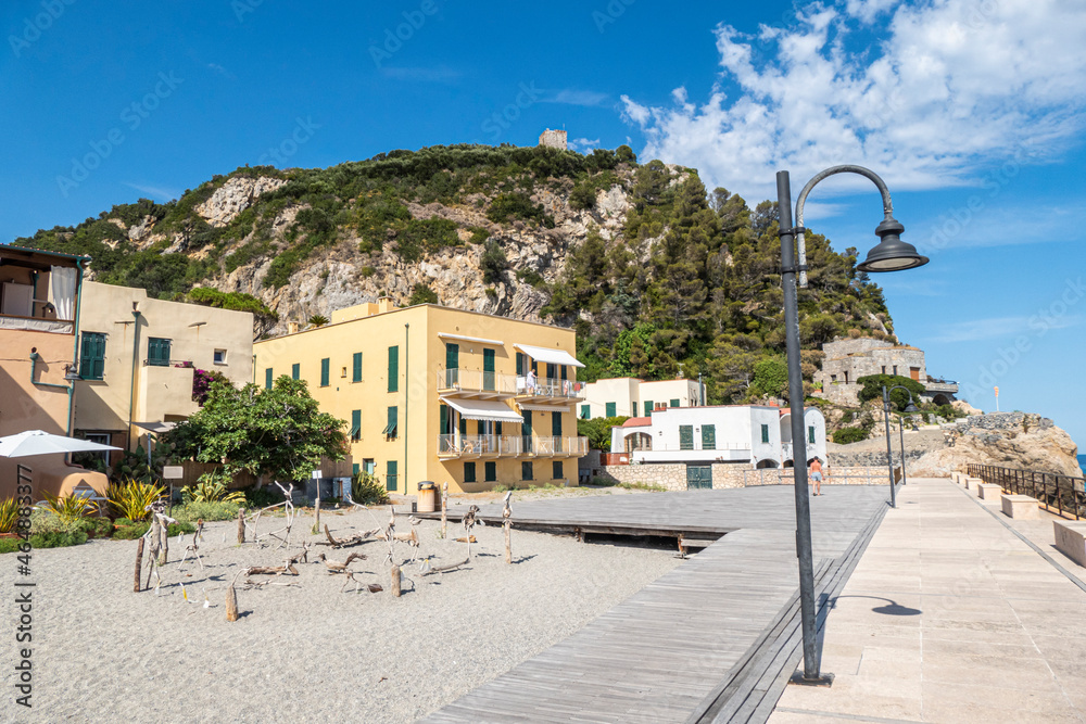 The promenade of Varigotti, with houses with colored facades