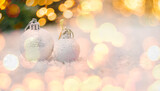 Two Christmas balls with bokeh light. Concept of post card for New Year holidays