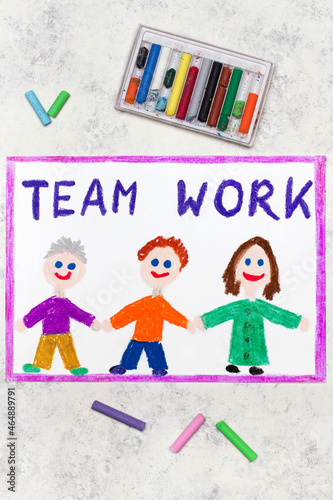 Colorful drawing: A group of smiling people and the slogan Team Work