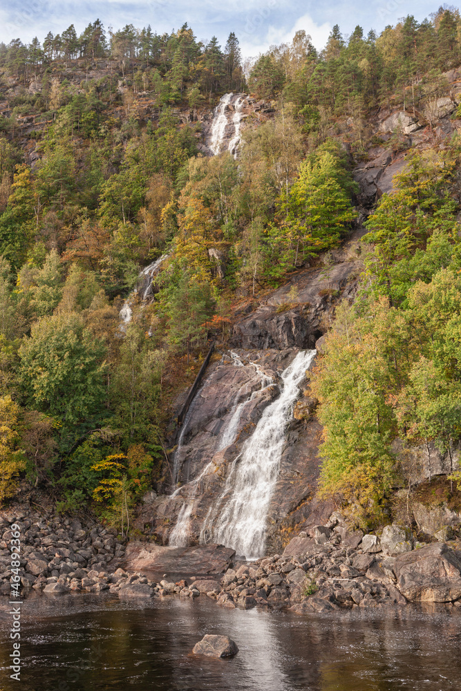 Waterfall in Norway, autumn landscape in the mountains