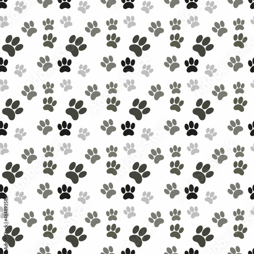 seamless patern footprints. white background. cute black and gray animal tracks. vector texture. print for textiles and wallpaper.