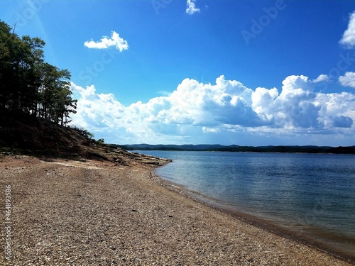 Fototapeta Naklejka Na Ścianę i Meble -  rocky lakeshore blue sky