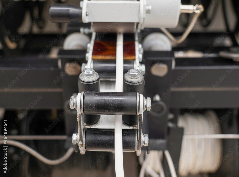 Close-up photo of a black and white machine