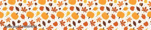 Seamless pattern with pumpkins, apples, pears, acorns and autumn leaves