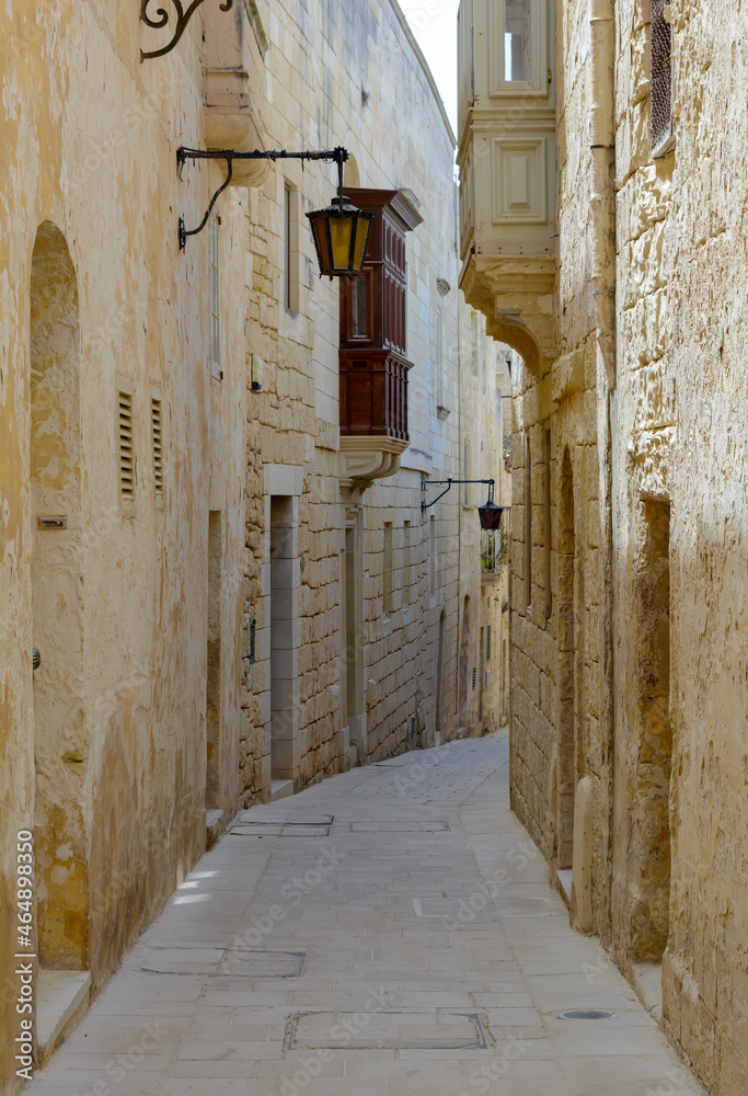 Typical Mdina street. Narrow medieval street of Mdina, also known as 