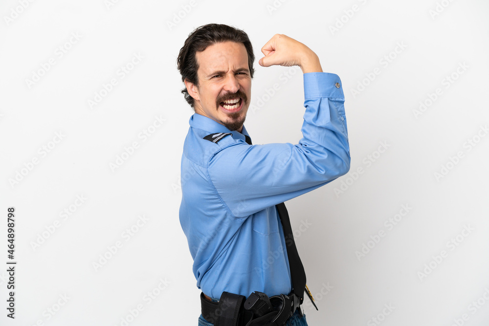 Young police man over isolated background white doing strong gesture Young police man over isolated background white doing strong gesture