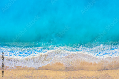 Top view aerial drone photo of Myrtos beach with beautiful turquoise water and sea waves. Vacation travel background. Ionian sea, Kefalonia Island, Greece photo