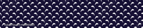 Seamless pattern with white dolphins