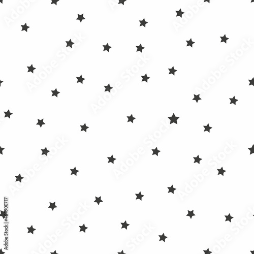 Seamless pattern with black stars on white background. Vector illustration. © Elnur