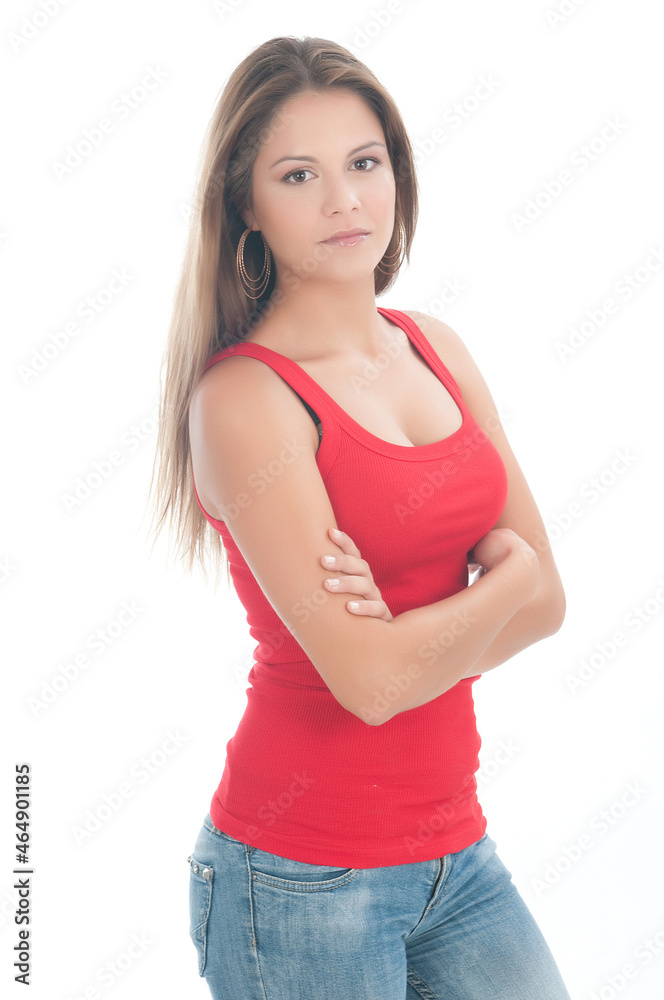 attractive woman in tank top with jeans. attractive woman in tank top with jeans.