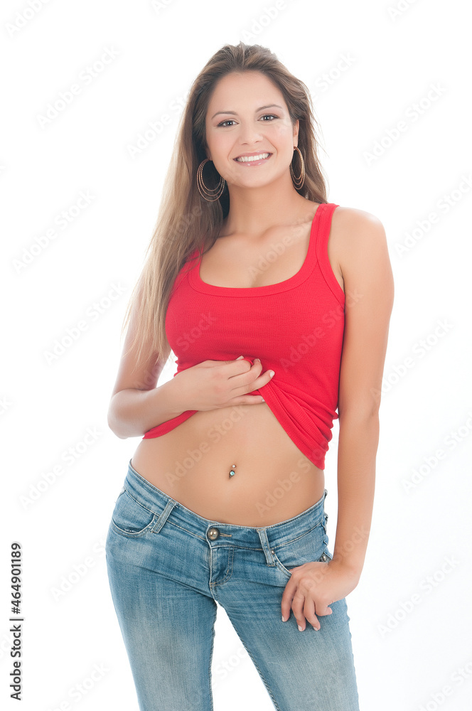attractive woman in tank top with jeans. attractive woman in tank top with jeans.