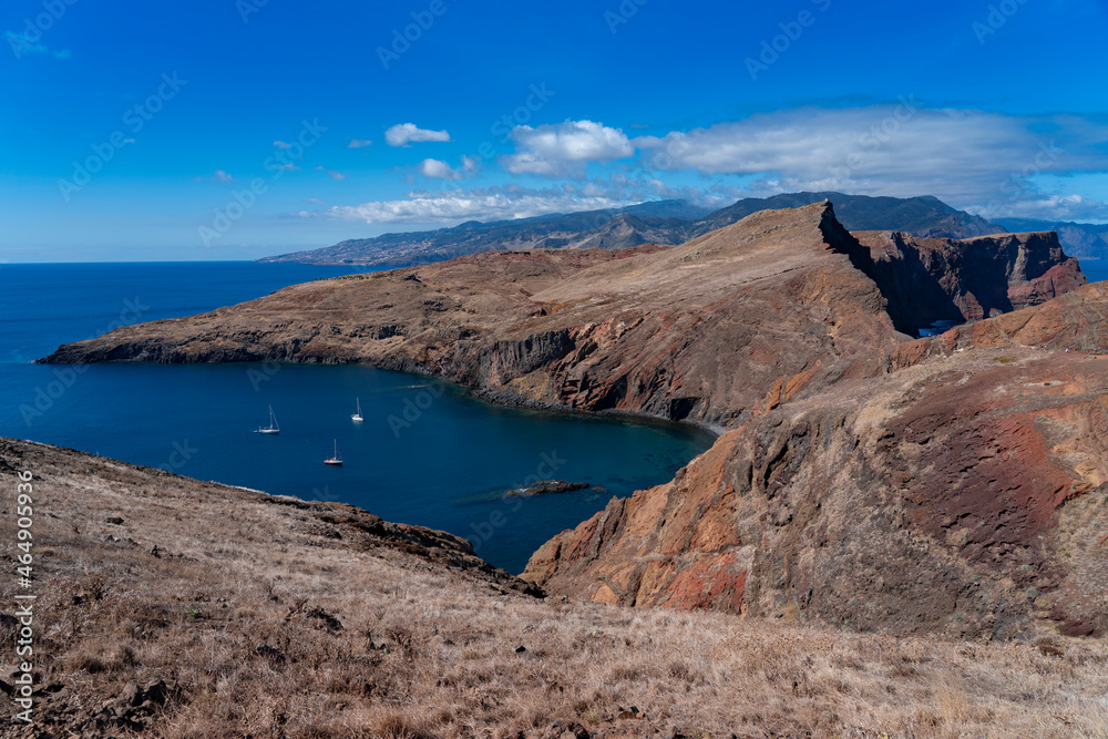 Sao Lourenco, Madeira, Portugal - a beautiful view of the Atlantic Ocean and harsh climate with mountains and bay including three boats 