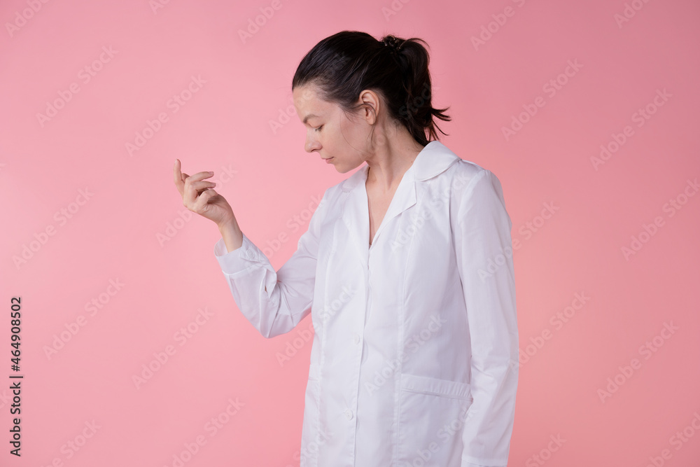A doctor, a laboratory assistant or a researcher in a white coat A doctor, a laboratory assistant or a researcher in a white coat
