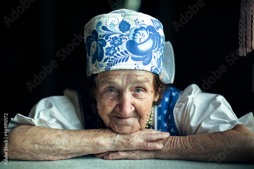 Portrait closeup of an elderly woman in ethnic Eastern European. photo