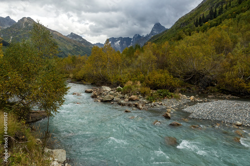 Stormy river in the autumn mountains