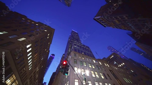 Establishing moving shot of skyscrapers buildings street in New York City Manhattan. 4k slow motion. Concept of American modern urban lifestyle, work in the city, NYC.