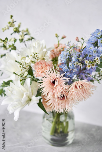 Finished flower arrangement in a vase for home. Flowers bunch, set for interior. Fresh cut flowers for decoration home. European floral shop. Delivery fresh cut flower. © malkovkosta