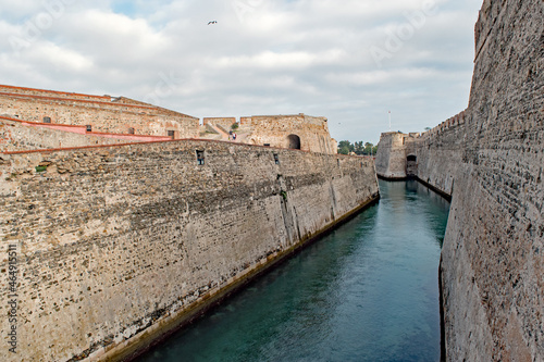 A moat within Plaza de Armas of the Royal Walls, a fortress, Ceuta, Spain. photo