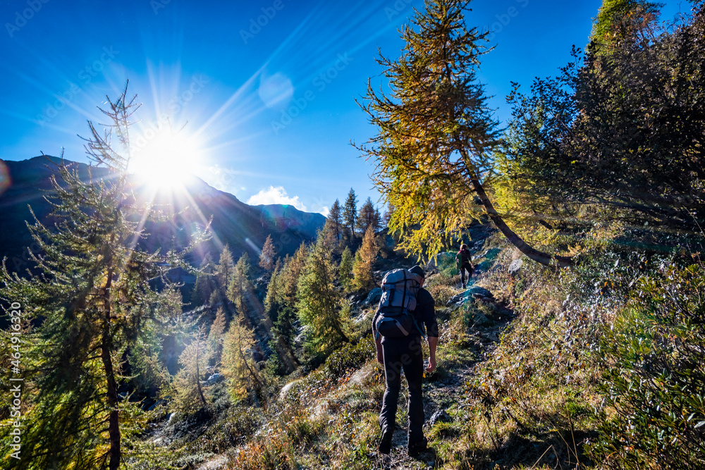 Mountaineering scene in autumn in the alps