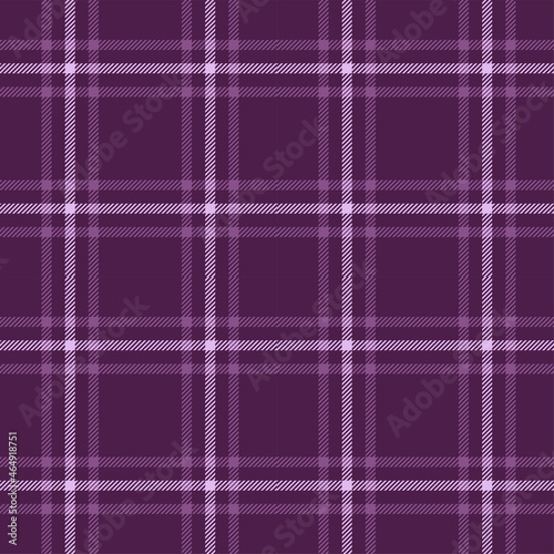 Purple tartan plaid. Scottish pattern fabric swatch close-up.