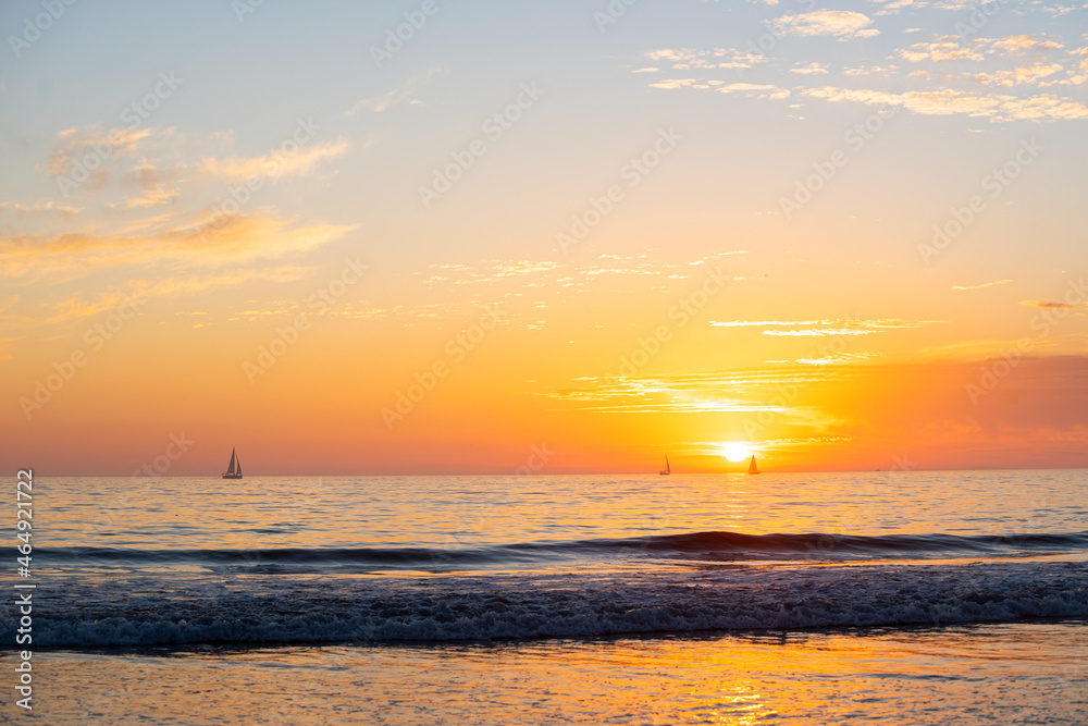 Sunset at the sea. Sunrise at beach. Colorful ocean beach sunrise.
