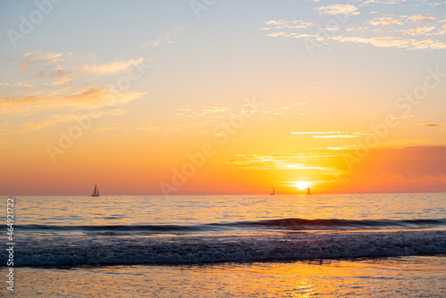 Sunset at the sea. Sunrise at beach. Colorful ocean beach sunrise.