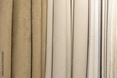 Set of pastel dense fabrics of uniform texture.