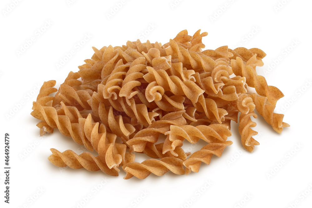 Fototapeta premium Wolegrain fusilli pasta from durum wheat isolated on white background with clipping path and full depth of field.