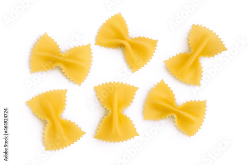 Bow tie pasta isolated on white background with clipping path and full depth of field. Top view. Flat lay.