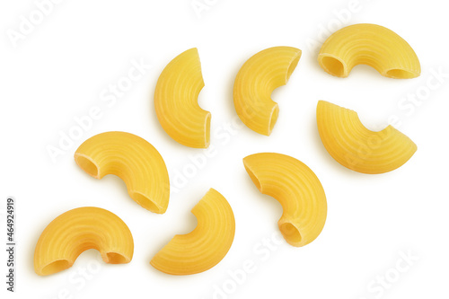 raw macaroni pasta isolated on white background with clipping path and full depth of field. Top view. Flat lay photo
