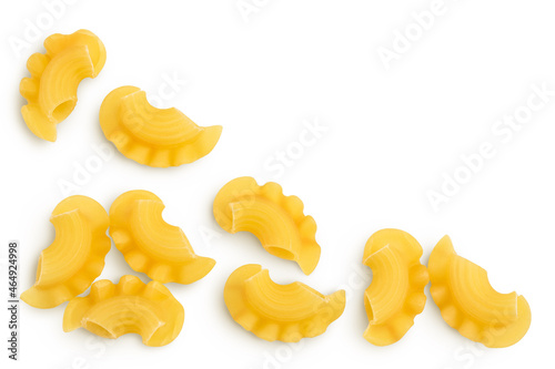 Pasta cornetti creste macaroni isolated on white background with clipping path. Top view with copy space for your text. Flat lay