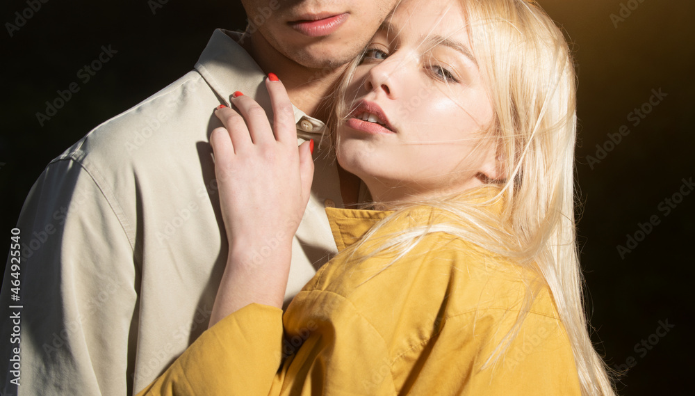 Fototapeta premium Sensual portrait of young couple in love. Tenderness couple touch. Loving couple embracing and kissing.
