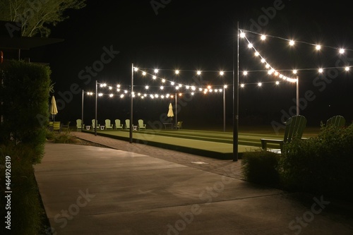 Bocce ball court lit up at night