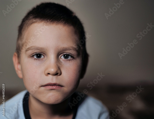 boy child looking at the camera. kid close-up with copy space