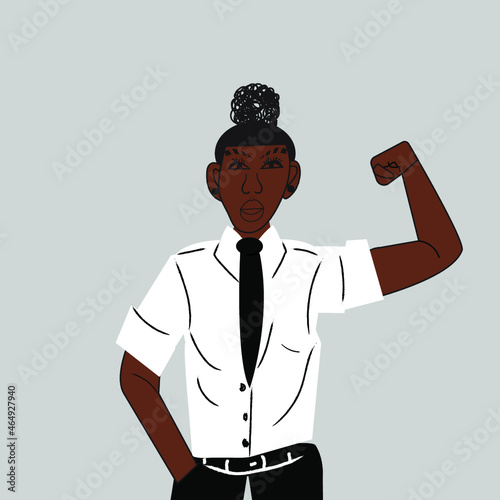 Lesbian woman flexing arm wearing a tie 