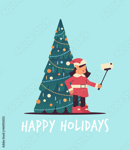 elf in uniform taking selfie photo on smartphone camera girl santa helper celebrating happy new year christmas holidays