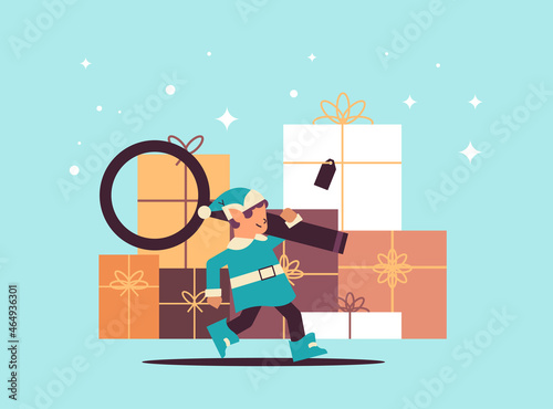 elf holding magnifying glass santa helper preparing for new year and christmas holidays celebration full length horizontal vector illustration