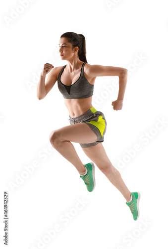 Sporty running woman on whi...