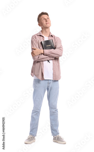 Young man with Holy Bible o...