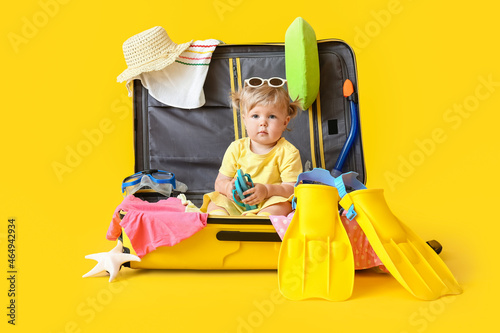 Cute baby girl in suitcase ...