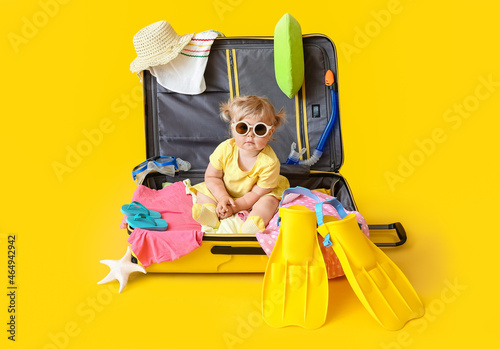Cute baby girl in suitcase ...