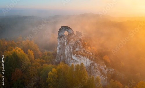 Okiennik wielki rock during autumn foggy sunrise - Jura Krakowsko-Czestochowska - Poland