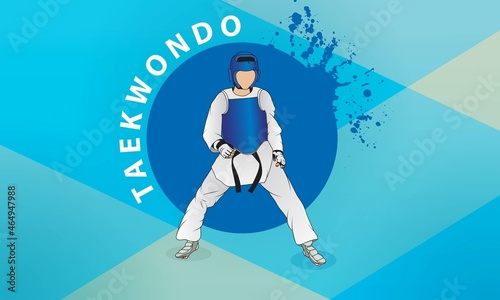 A young fighter in a combat stance and a black belt in taekwondo on an abstract background.